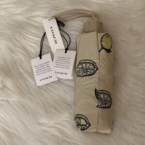 COACH Mini Lemon UV Protection Umbrella in Garden Grove Yellow